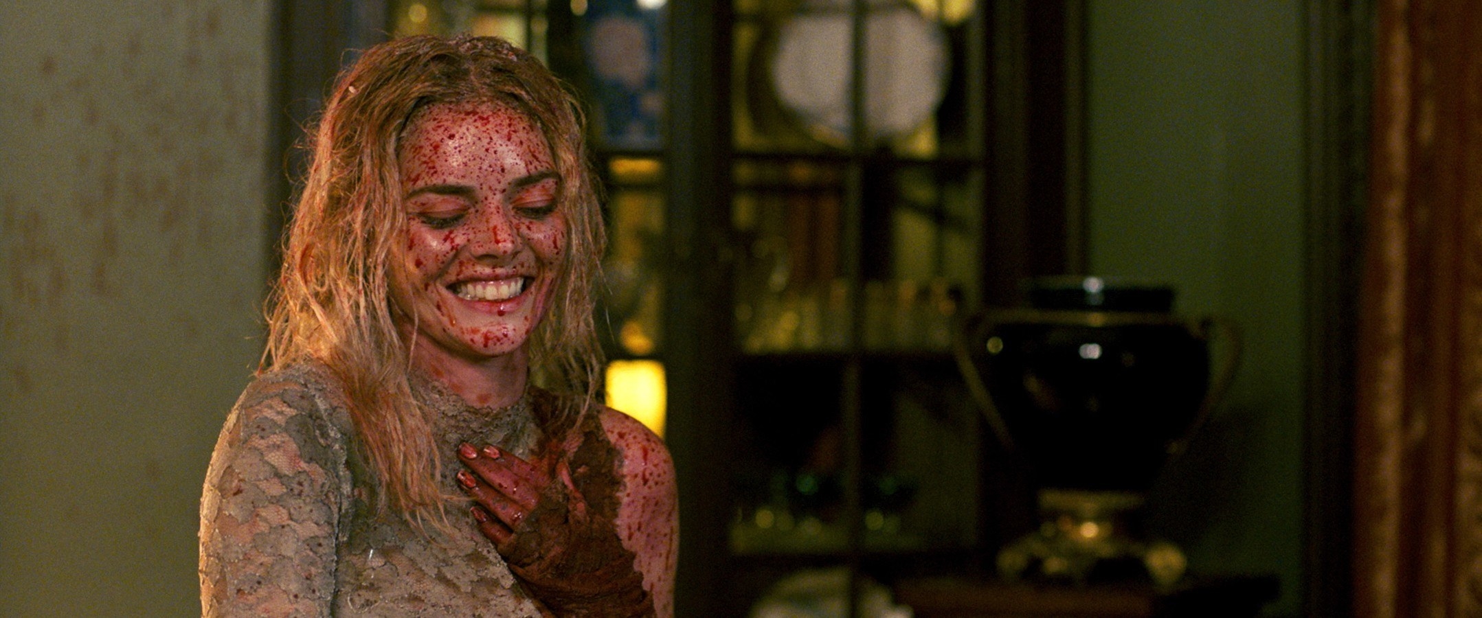 Samara Weaving as Grace in Ready or Not covered in blood