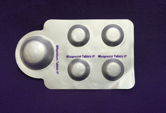 a combination pack of mifepristone (L) and misoprostol tablets, two medicines used together, also called the abortion pill