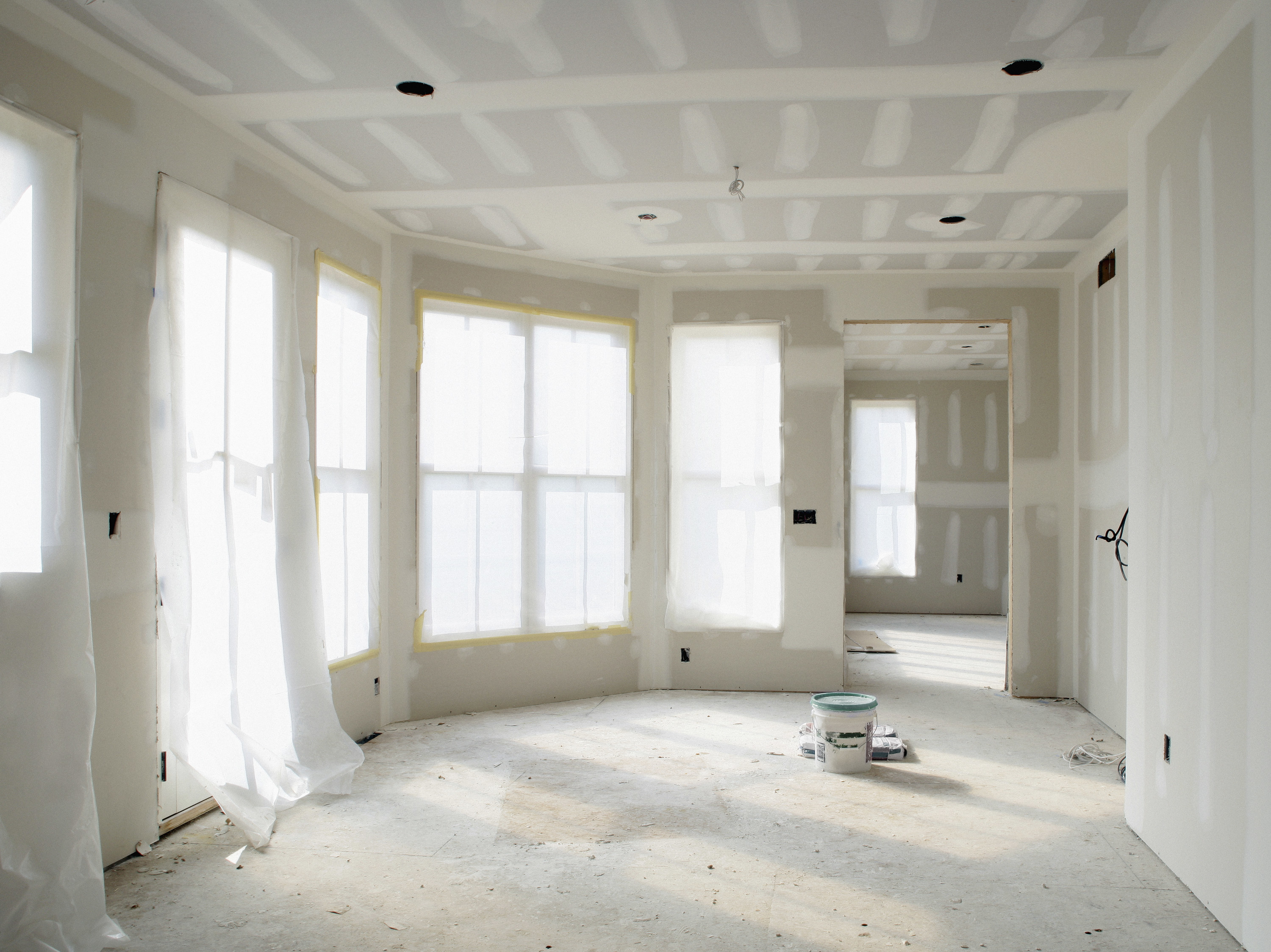 The interior of a room being remodeled with drywall