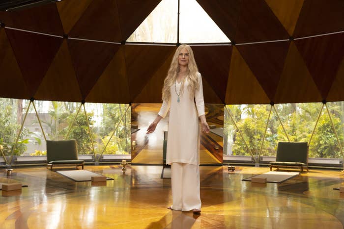 Nicole Kidman as Masha dressed in an all-white top; she is standing in a room filled with natural light
