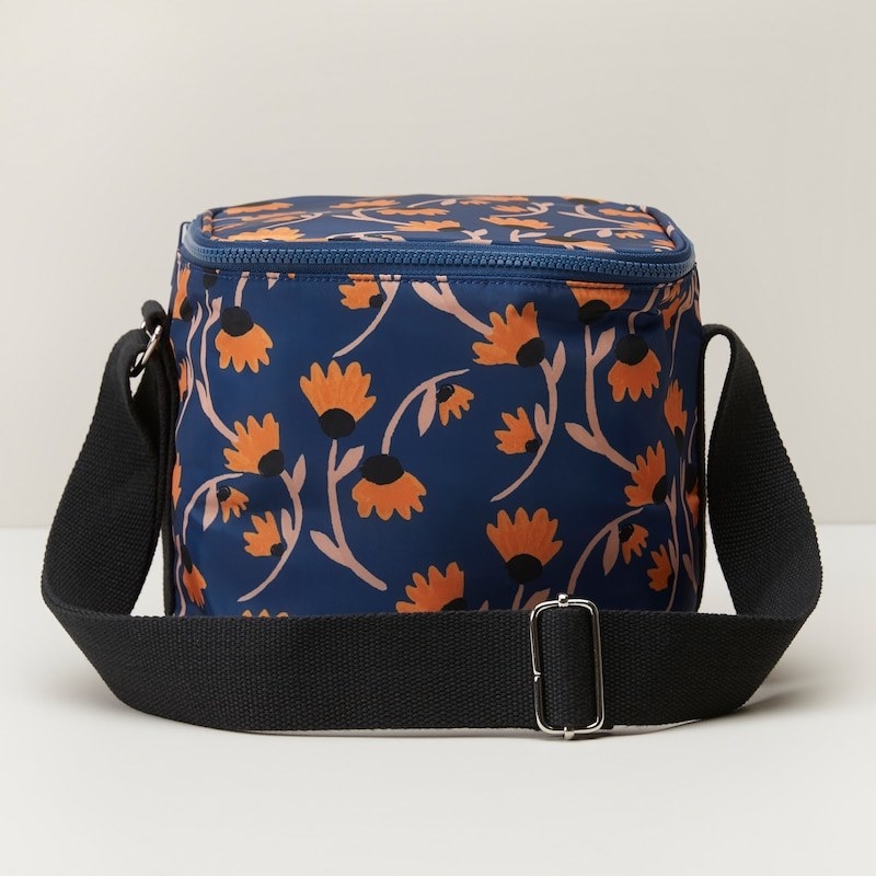 a rectangular lunch bag with a floral pattern on it