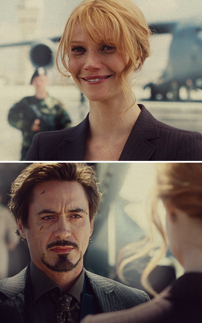 Pepper and Tony looking at each other at the end of &quot;Iron Man&quot; with battle scars on their faces