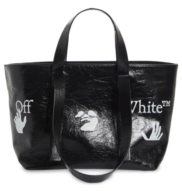 the black tote with an off-white logo on it
