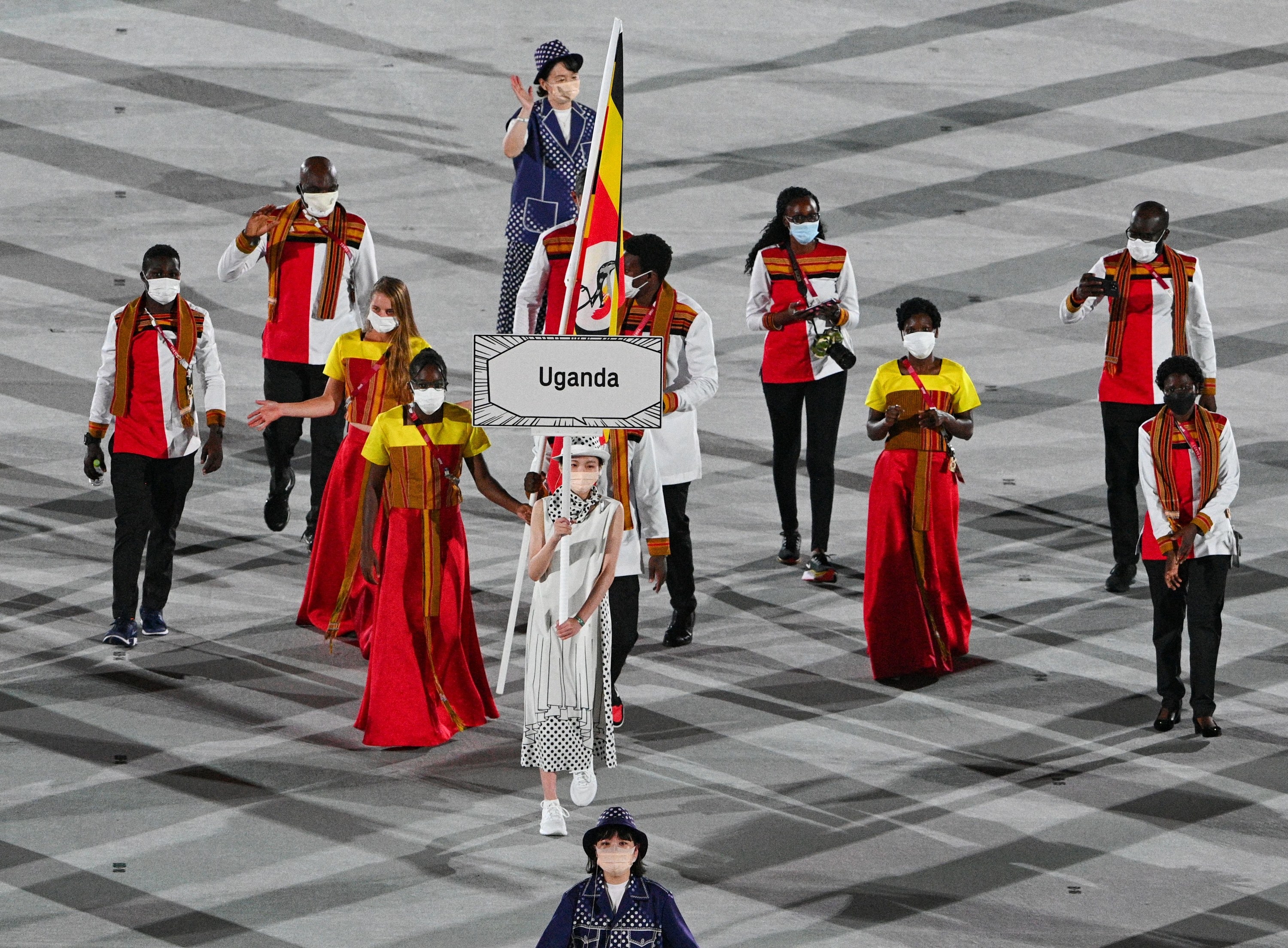 The athletes wore mutlicolored traditional dresses and tops