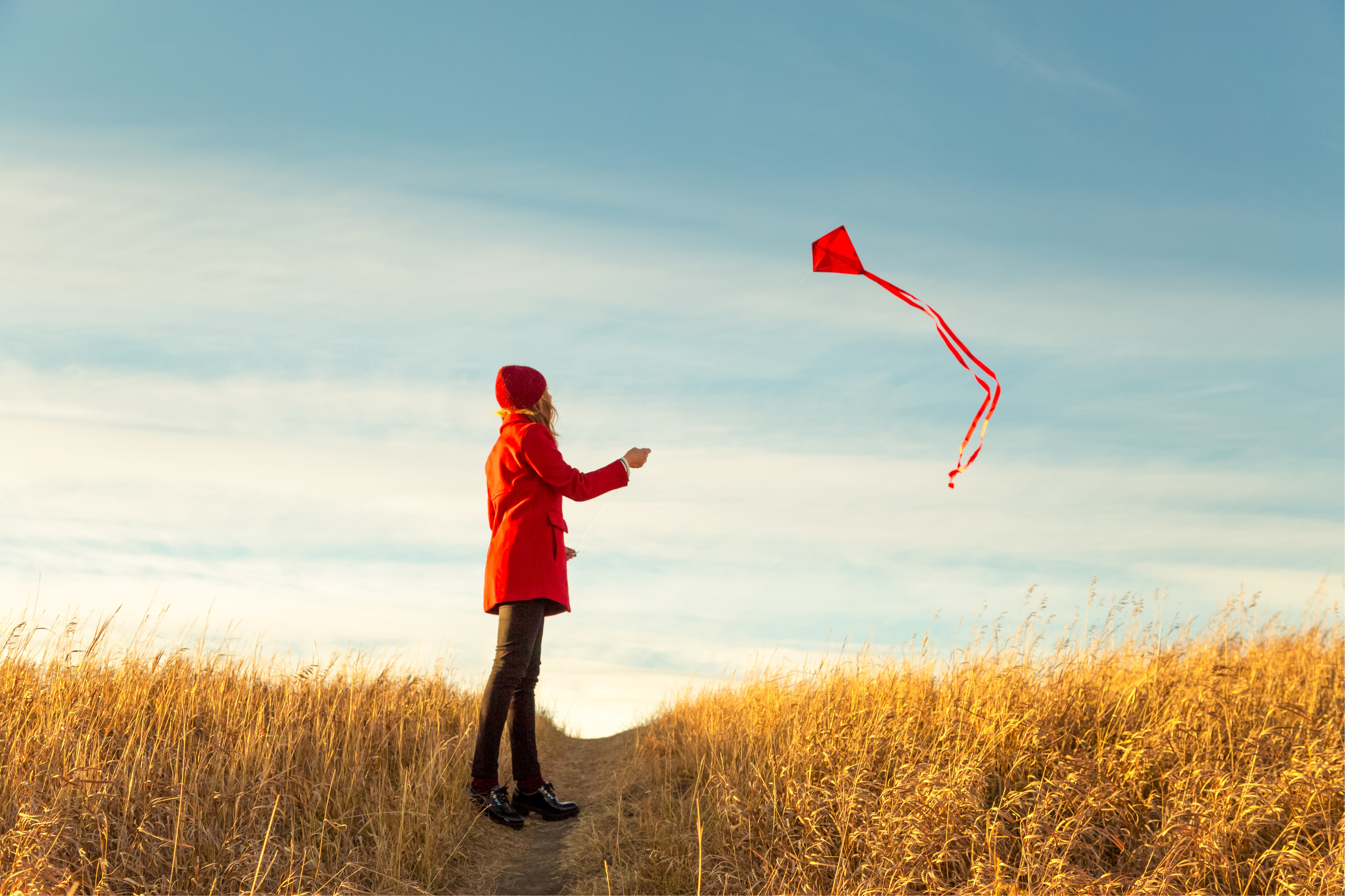 Woman flying a kite