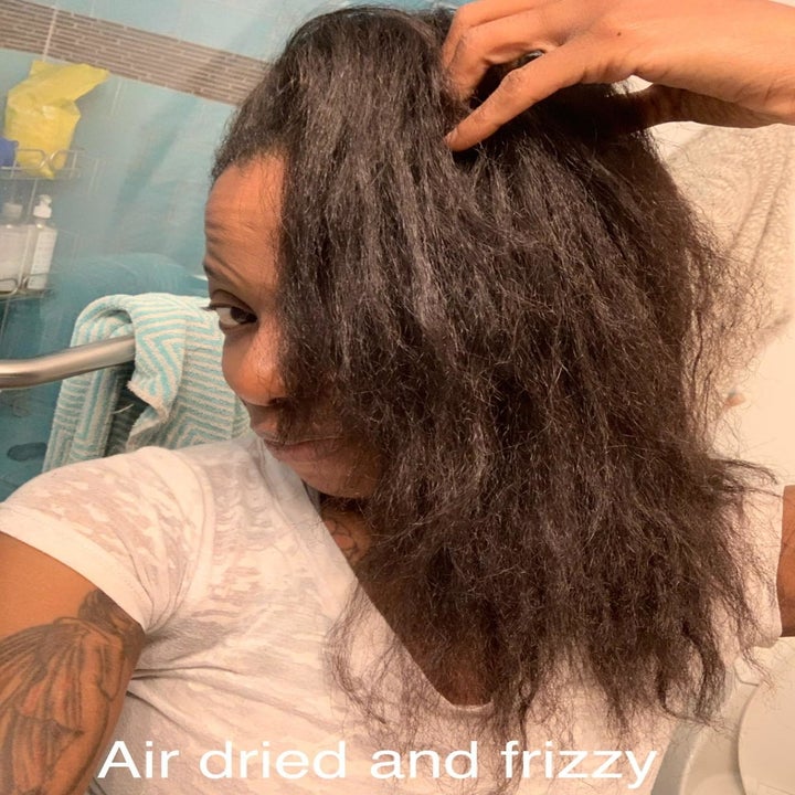 reviewer showing her hair "air dried and frizzy"