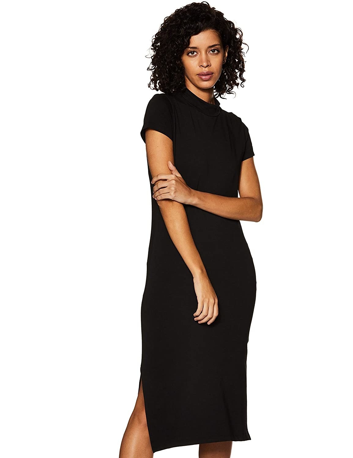 A black form-fitting dress with a slit near the leg