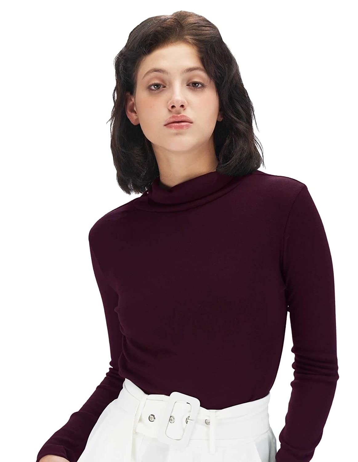 A woman wearing full sleeve turtleneck top