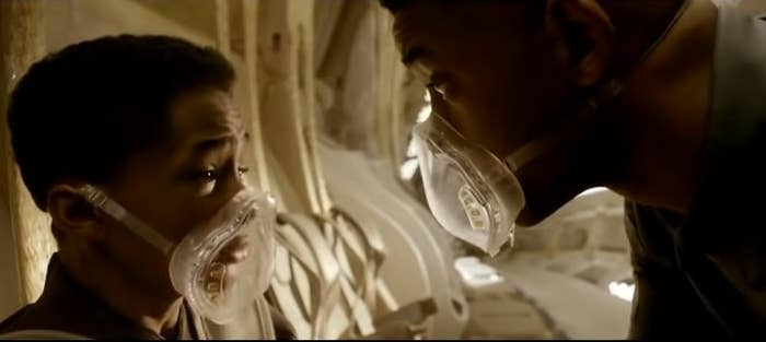 Jayden Smith and Will Smith wear oxygen masks on a space ship