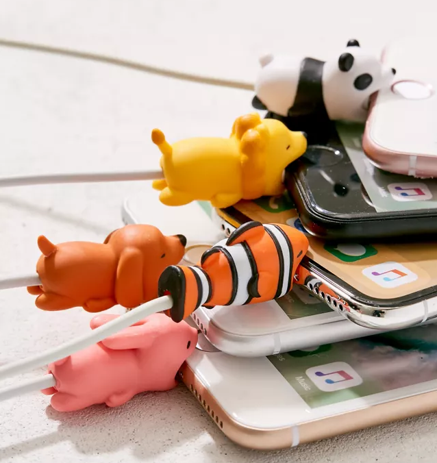 A ton of silicone animals attached to phone charging cables