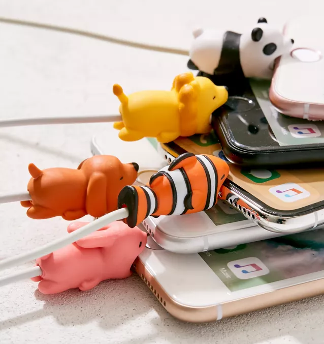 A ton of silicone animals attached to phone charging cables