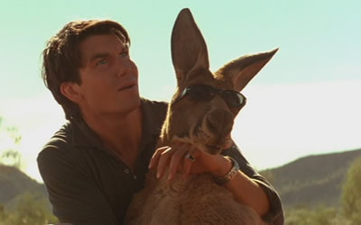 A man holding a kangaroo