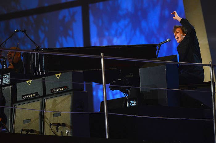 Paul McCartney plays piano at the opening ceremony