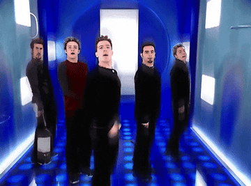 GIF of NSYNC performing in sync