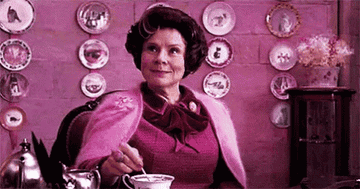 Umbridge stirring her tea in Harry Potter