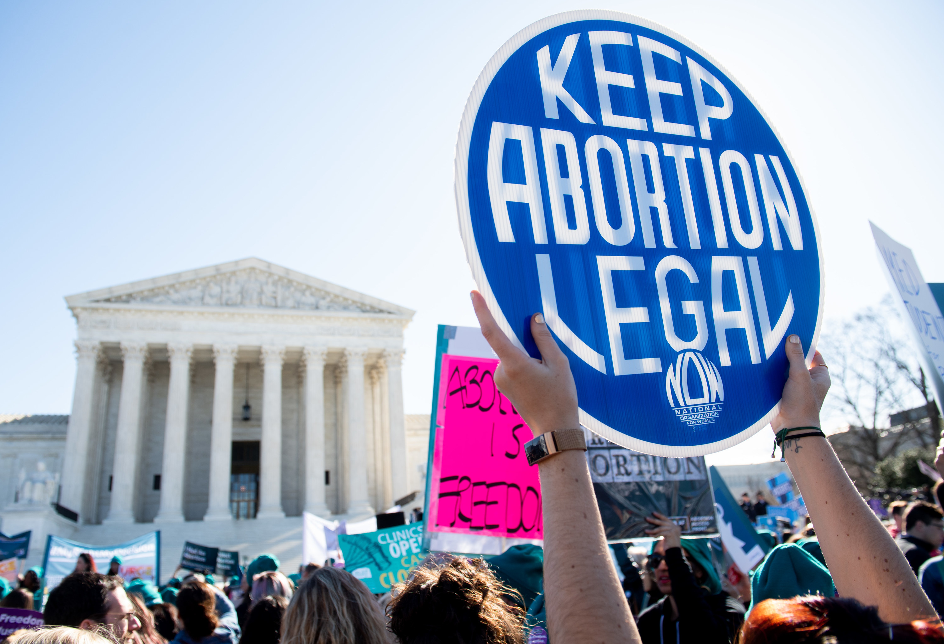 An image of a &quot;keep abortion legal&quot; sign at a protest