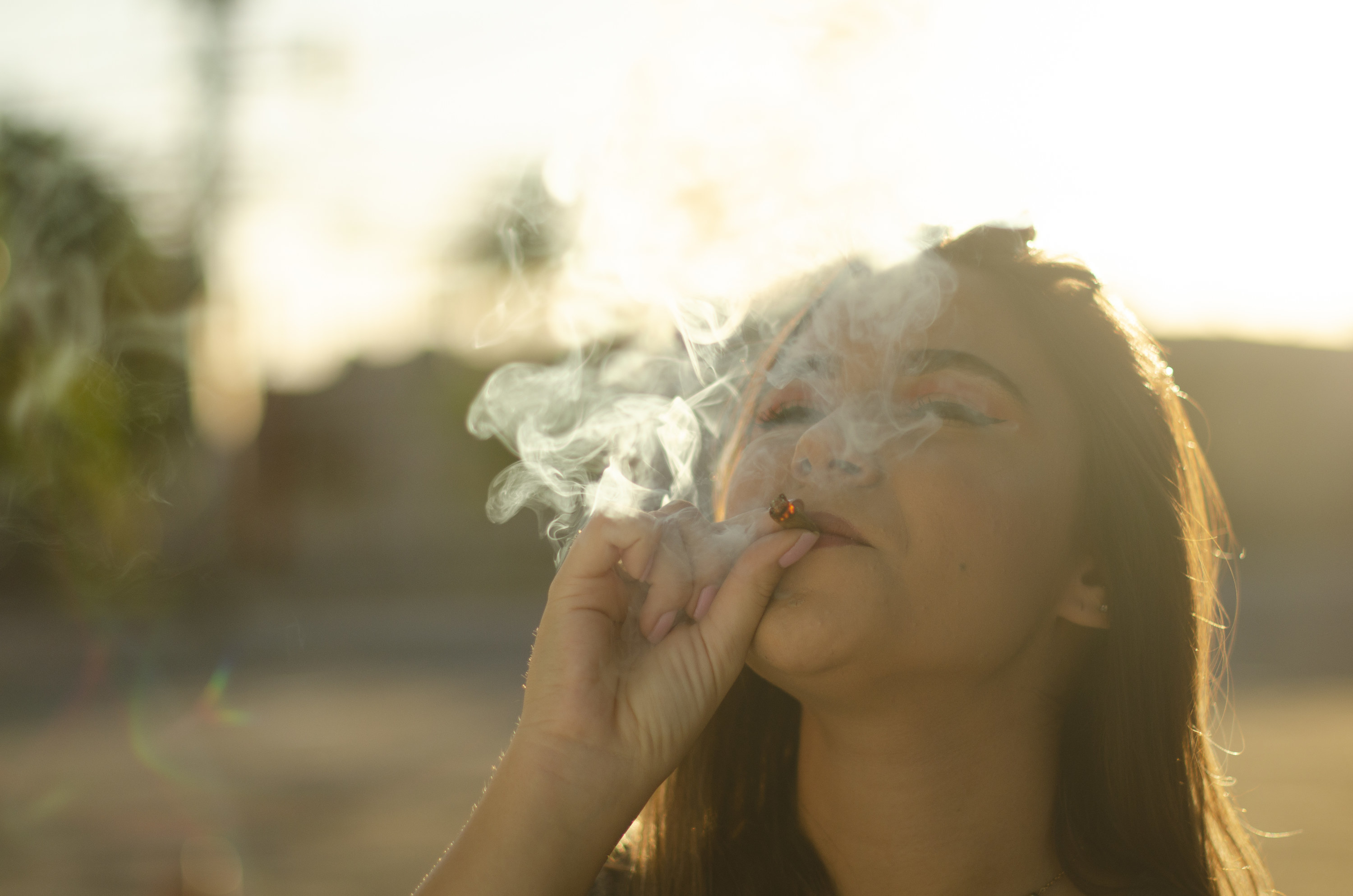 An image of a woman smoking weed