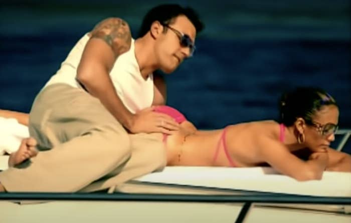 Ben puts his hand on Jen&#x27;s booty while they lay on a yacht in the music video