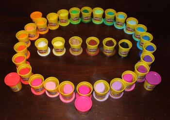 Reviewer's photo showing the assortment of colors in the play dough set