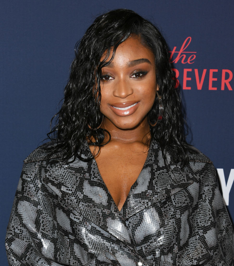 Normani wears a snakeskin-print outfit and wavy hair at the 9th Annual Streamy Awards at The Beverly Hilton Hotel