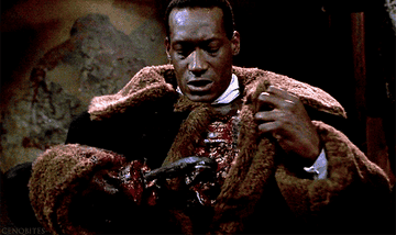 the candyman opening up his chest cavity and revealing a swarm of bees