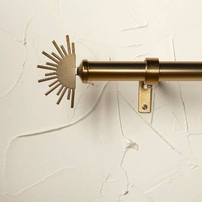 Bronze curtain rod with half sunbeam on each side
