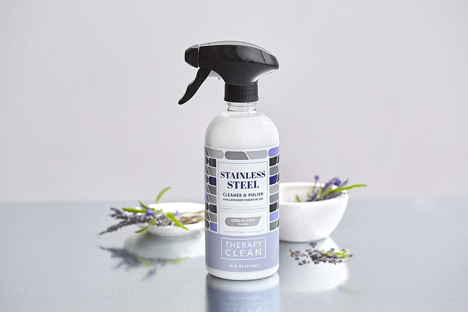 the spray bottle of cleaning product