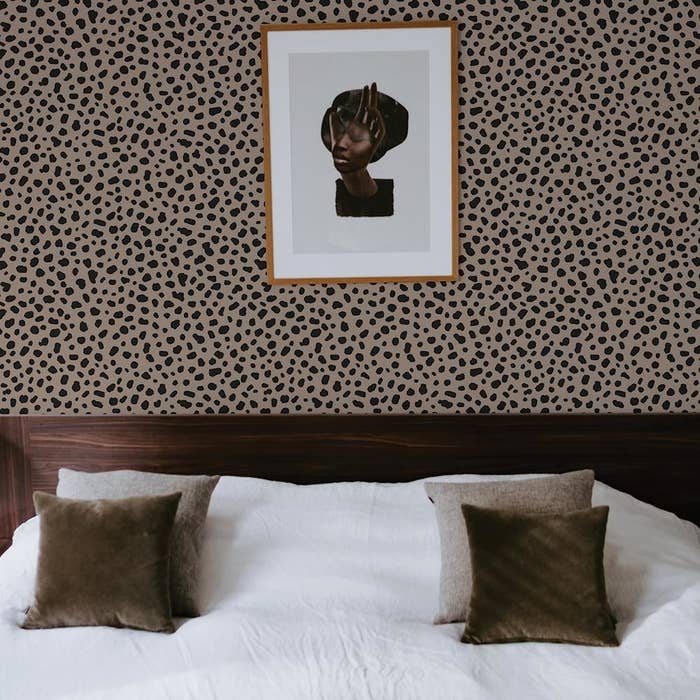 Leopard print wallpaper in a bedroom
