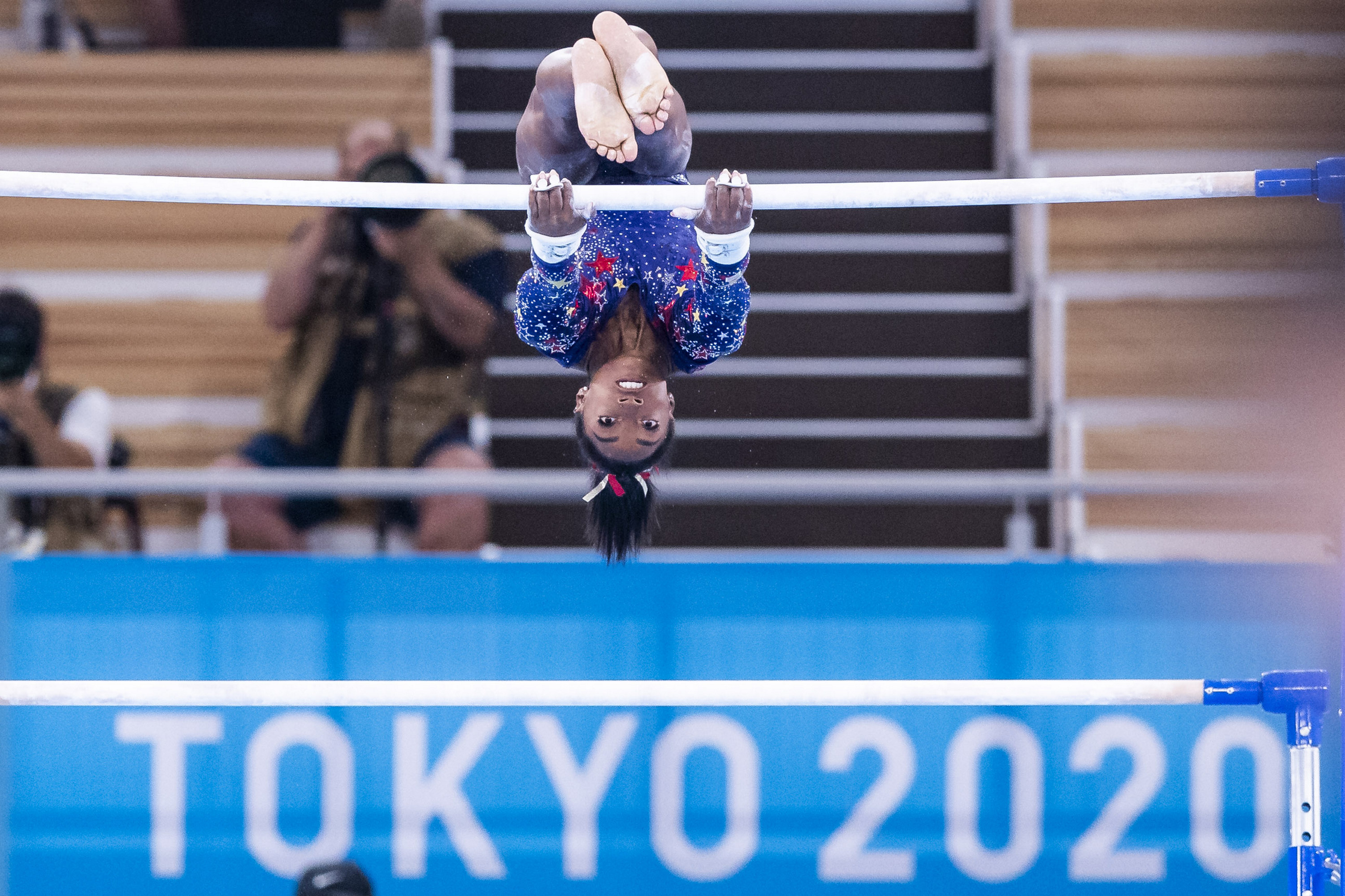 Simone spinning over the high bar