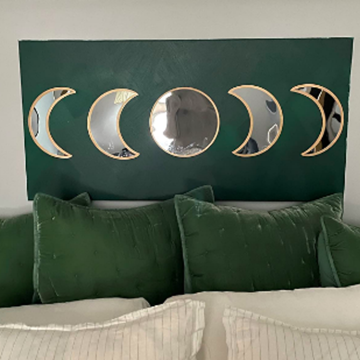 reviewer's diy project with mirrors turned into headboard using rectangular painted block above bed