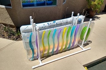 PVC pipe organizer to hold long pool rafts