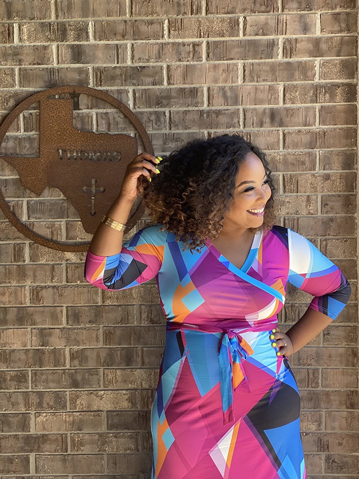 image of reviewer wearing the multicolored triangle maxi dress