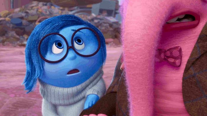 sadness looks up at bing bong with wide eyes