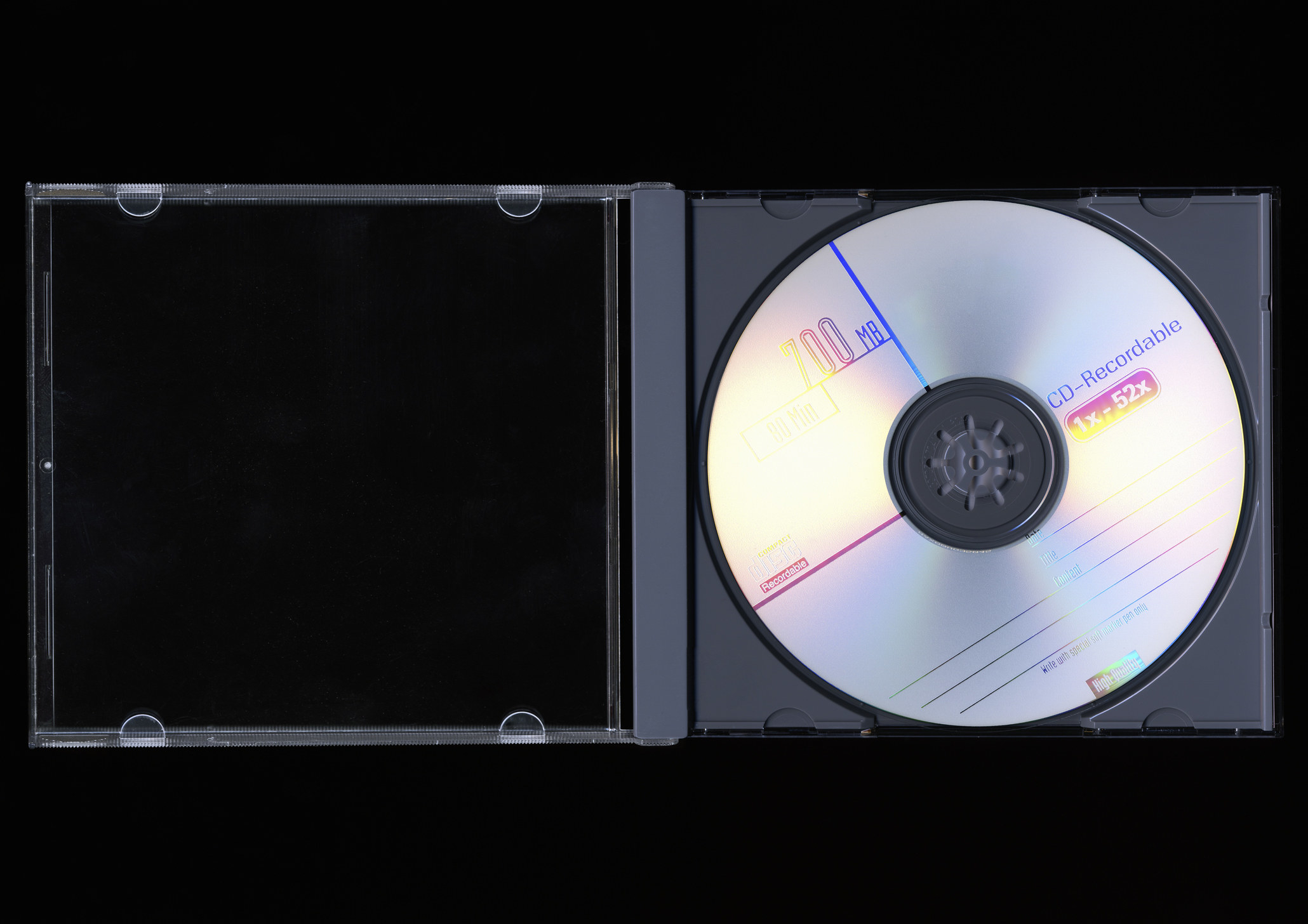 An open CD case with a blank CD inside