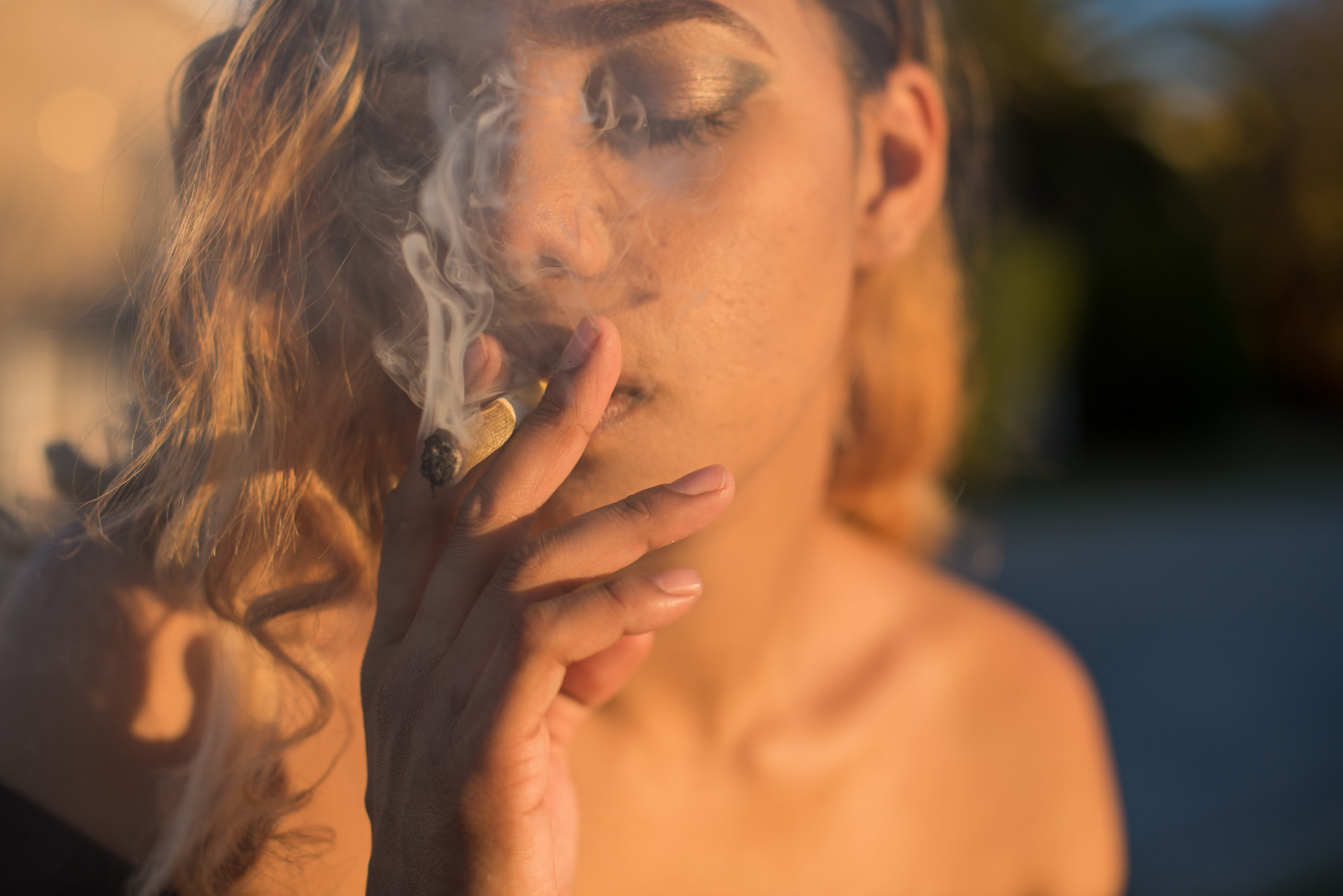 An image of a woman smoking weed