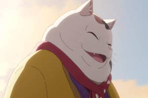 an animated cat laughs
