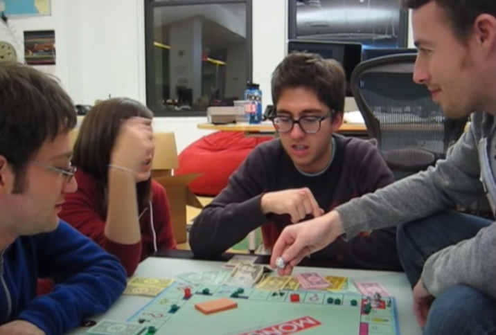 Screenshot of Jake and Amir playing Monopoly with two other people