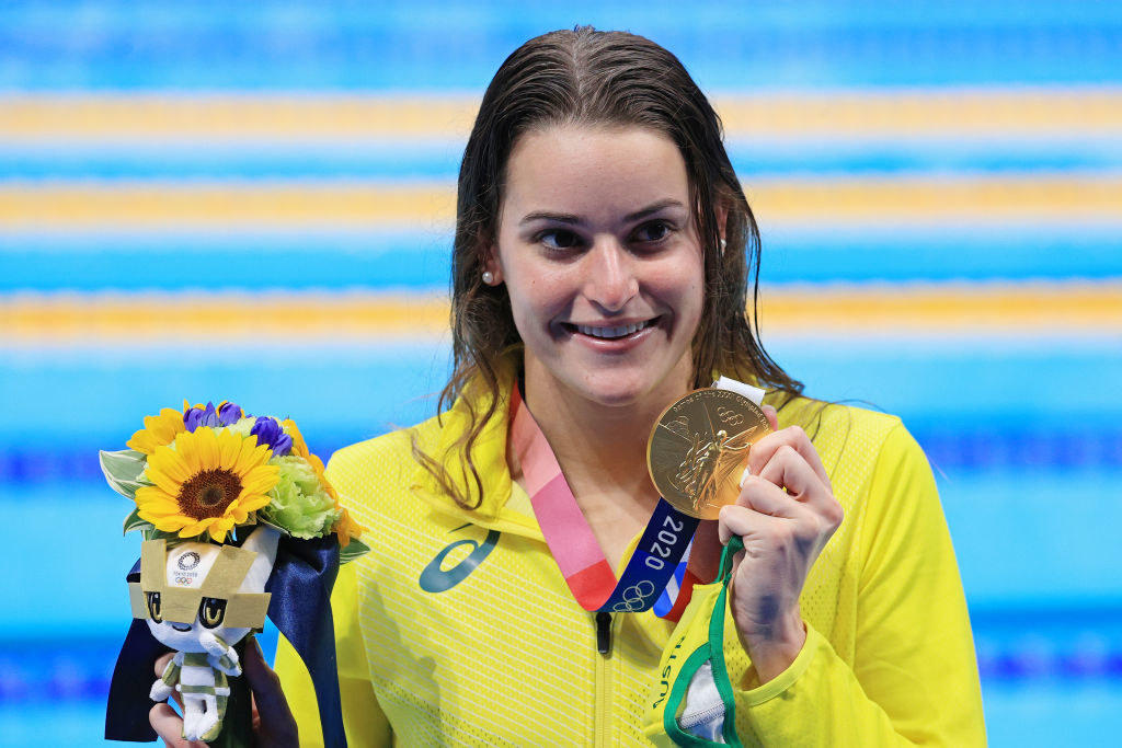 Kaylee McKeown posing with her gold medal during the victory ceremony