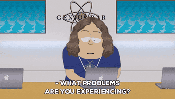 An employee at the Genius Bar asking &quot;What problems are you experiencing?&quot;