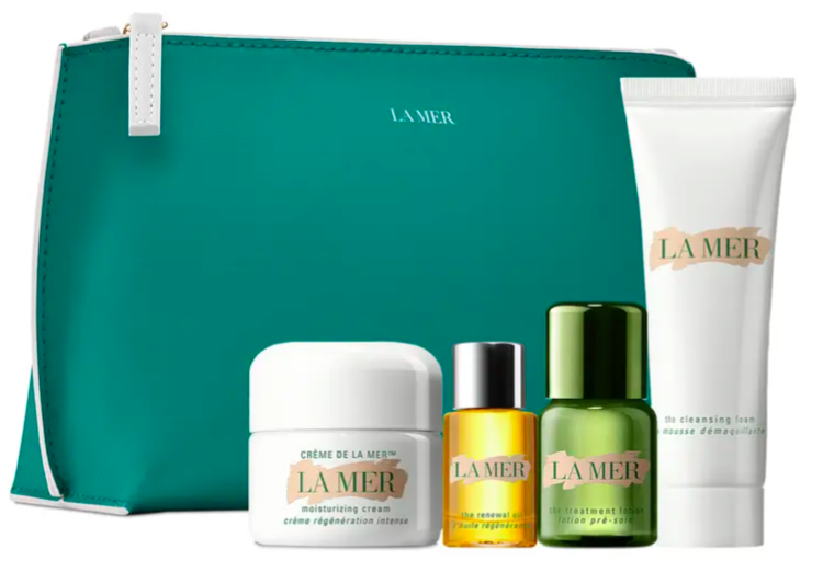 The set next to a La Mer green travel bag