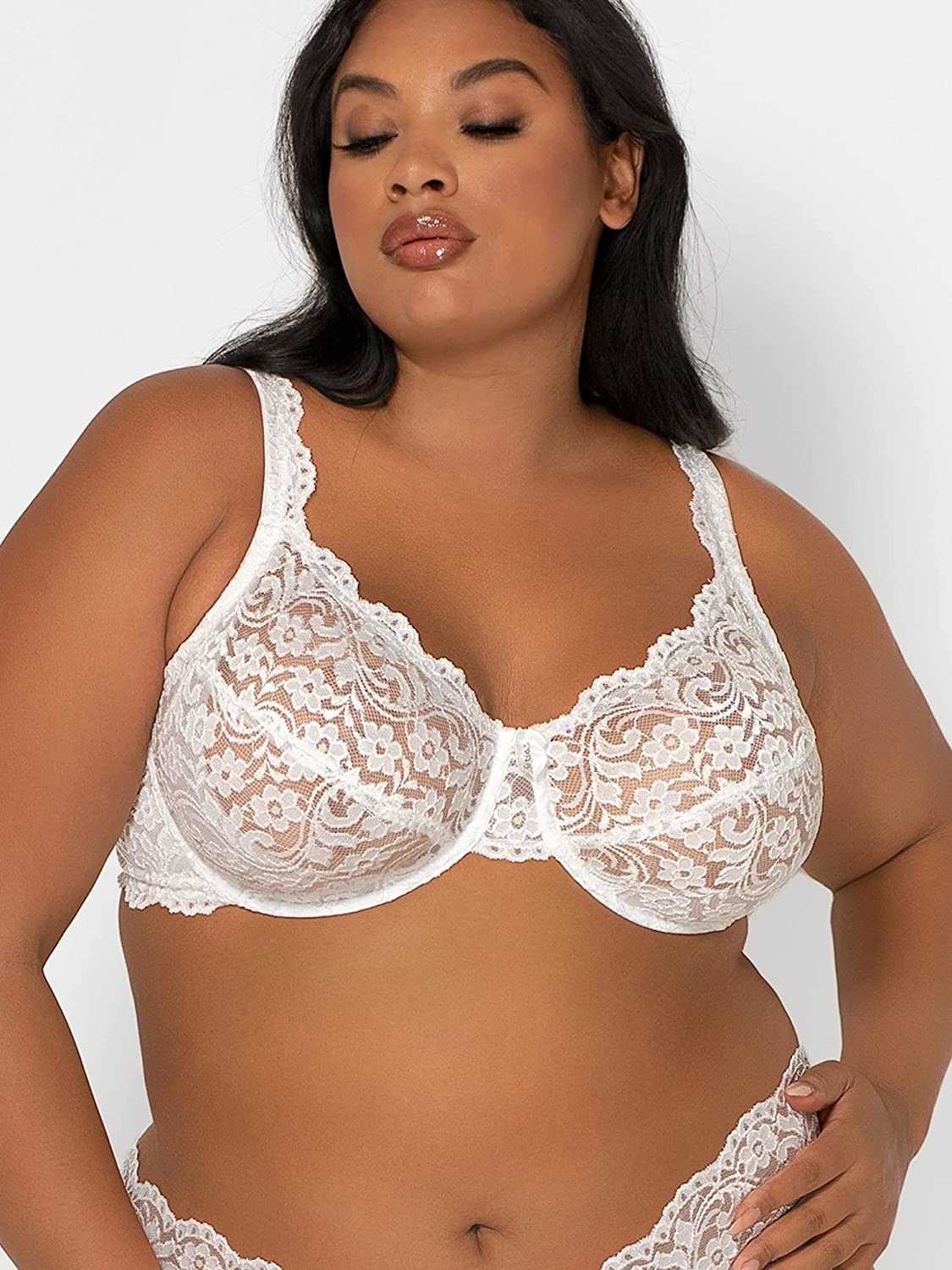 Model wearing white bra