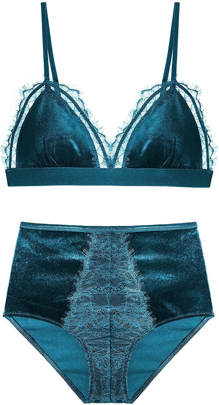 Blue velvety lingerie set on white background