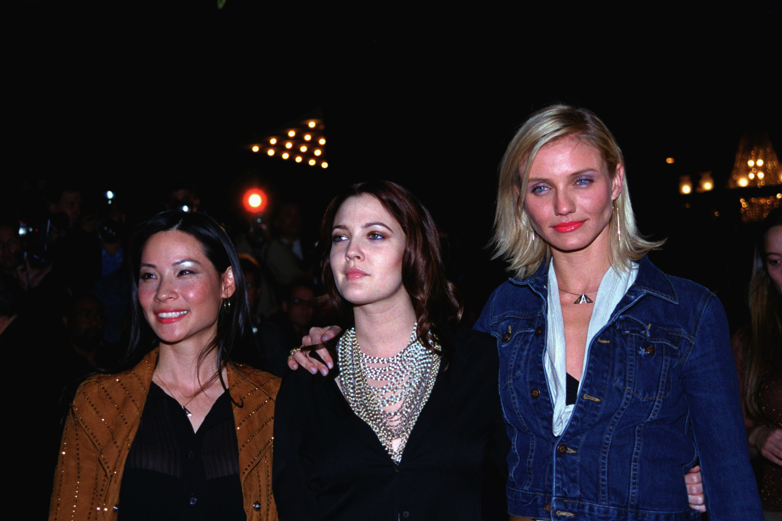 Lucy Liu, Drew Barrymore, and Cameron Diaz are pictured at an event in 2000