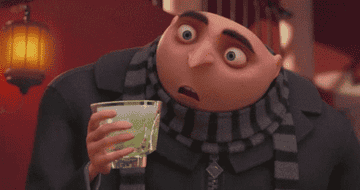 Gru looking shocked and breaking the glass he&#x27;s holding in Despicable Me