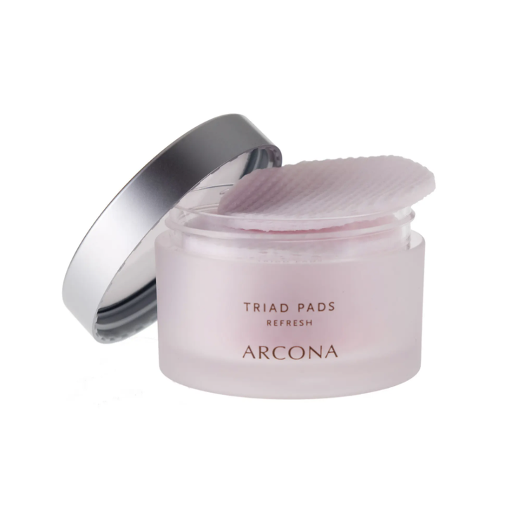 the open toner pad container revealing a toner pad