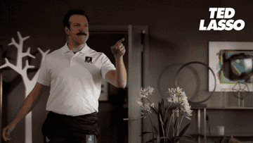 GIF of Ted Lasso pointing and saying yes
