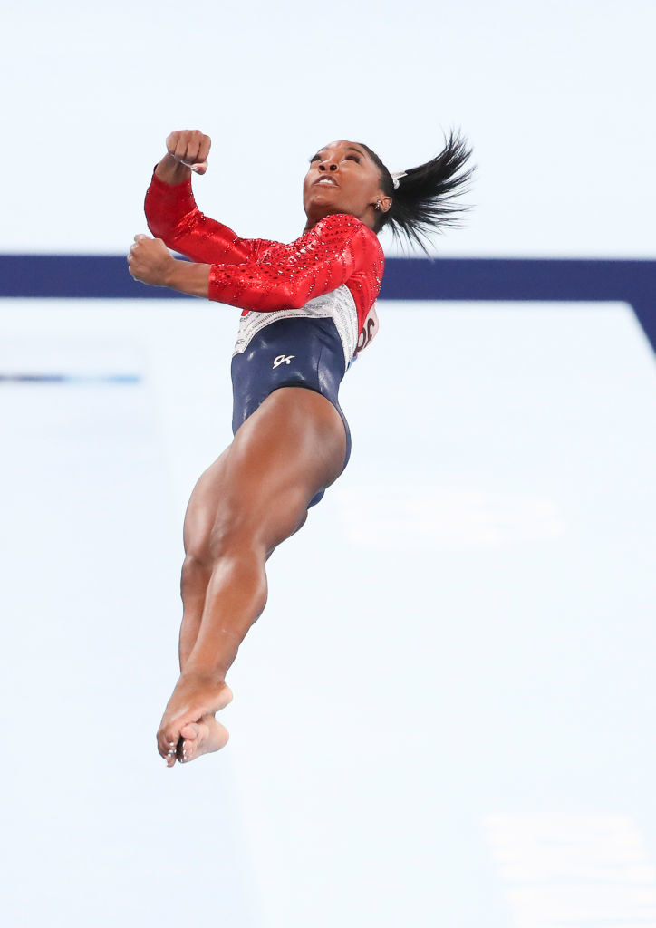 Biles in midair during her vault