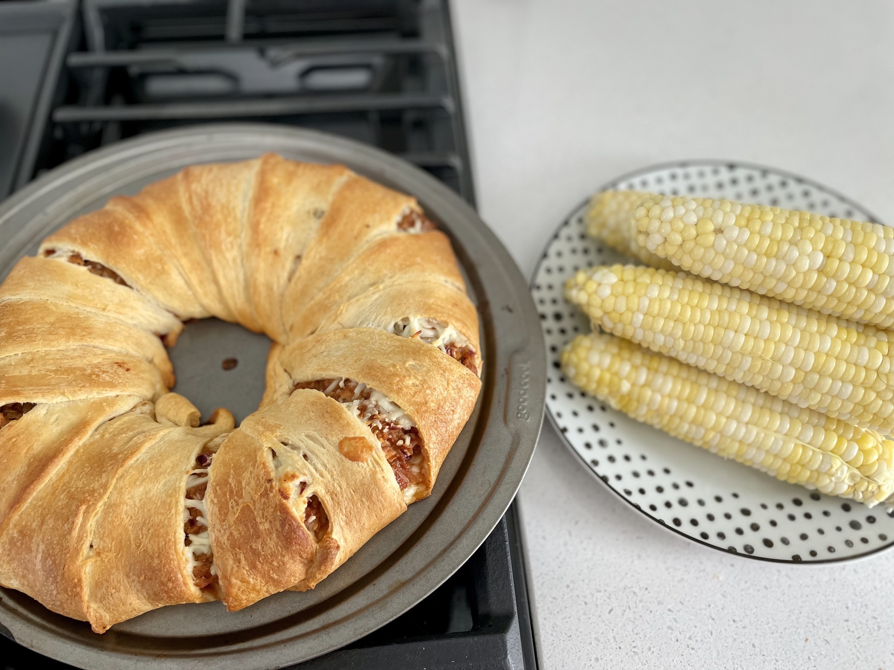 Plated BBQ chicken ring and corn
