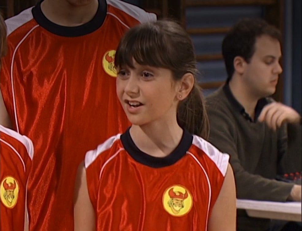 Alyson Stoner in a basketball jersey