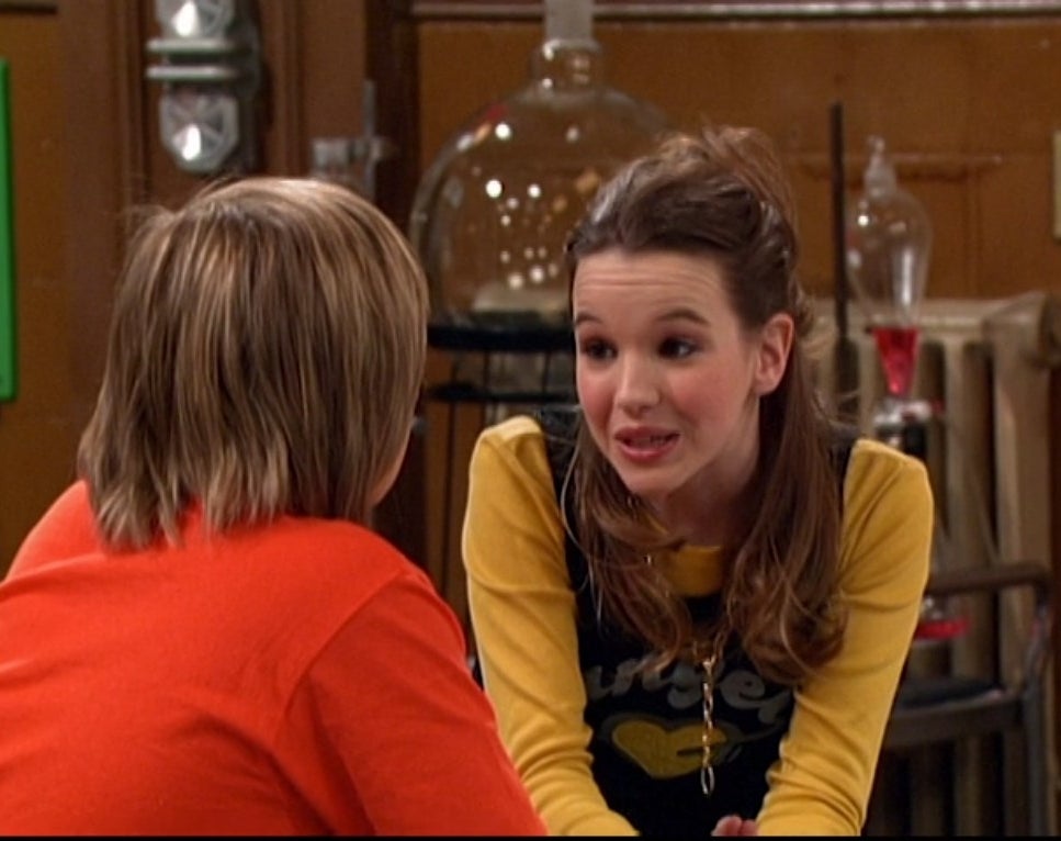 Kay Panabaker talks to Dylan Sprouse in a science lab